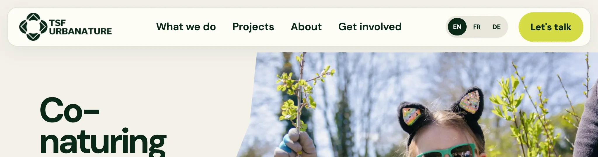 New header: the logo, What we do, Projects, About, Get involved, an EN/FR/DE switch and a “Let’s talk” button, above the headline.